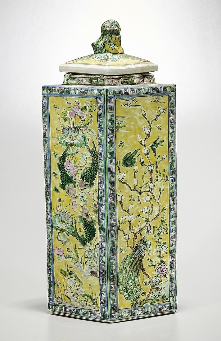 Chinese Enameled Porcelain Covered Vase: Chinese enameled porcelain vase; of exaggerated diamond form; depicting trees, flowers and animals; lion finial; 22" x 10" x 5 1/2" (approx.) Condition: wear, frits, pits, minor loss