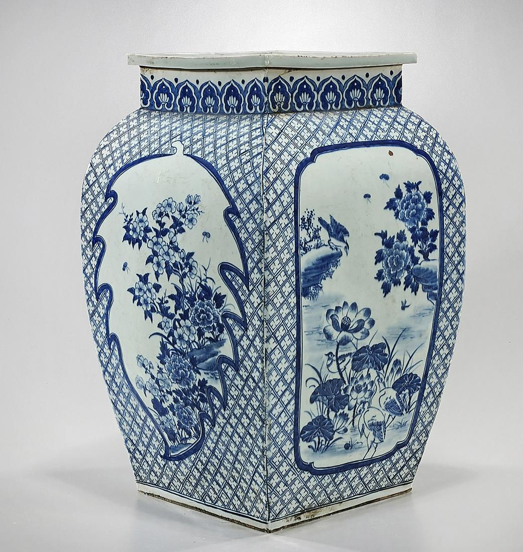 Large Chinese Blue and White Porcelain Four-Faceted: Large Chinese blue and white porcelain four-faceted vase; with flower and bird scenes flanked by repeating floral pattern design; 19" x 11 1/2 sq. (approx.) Condition: wear, minor losses