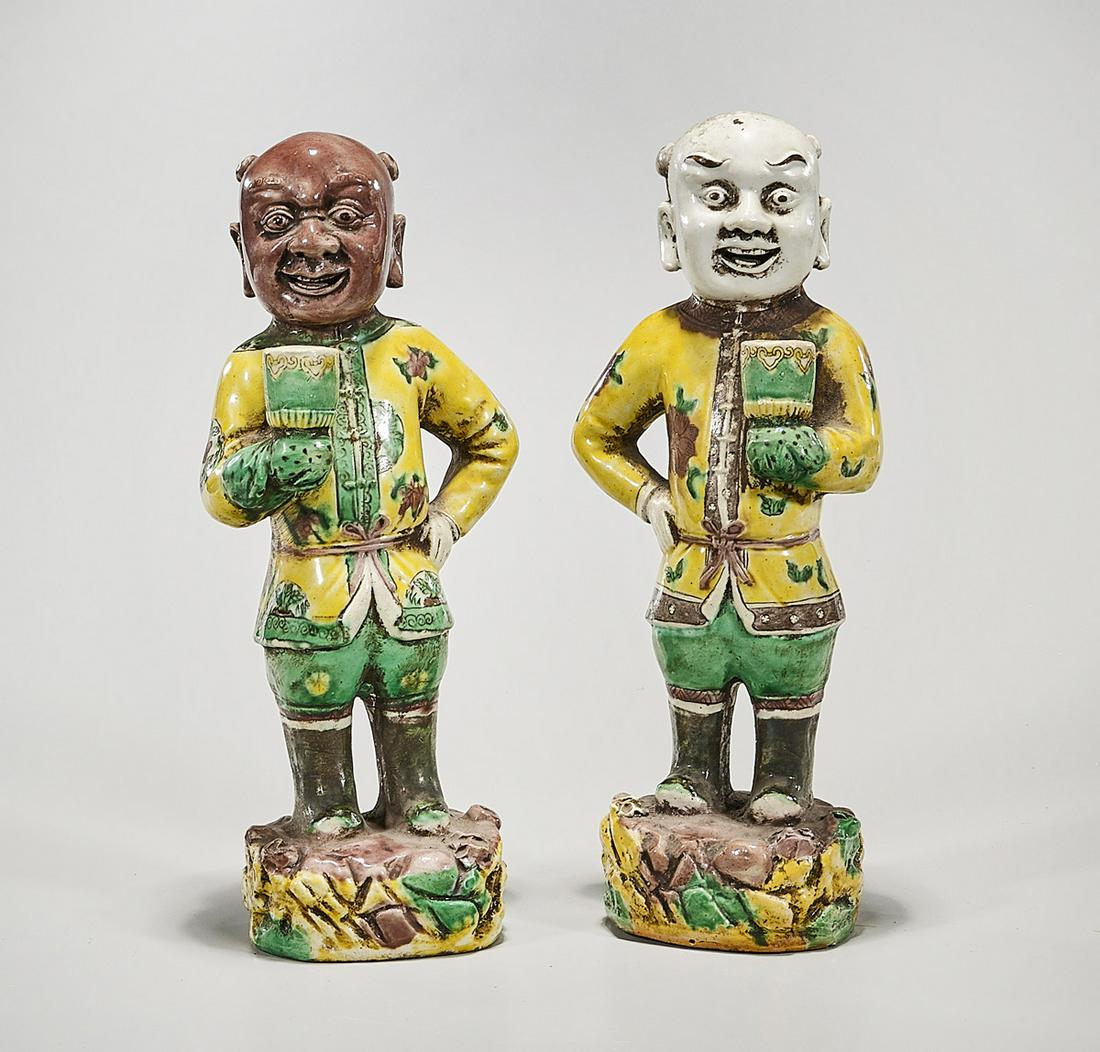 Two Chinese Glazed Porcelain Figures: Two Chinese glazed porcelain figures; 11 1/2" x 4" x 3" (each, approx.) Condition: wear, frits, pits, minor loss