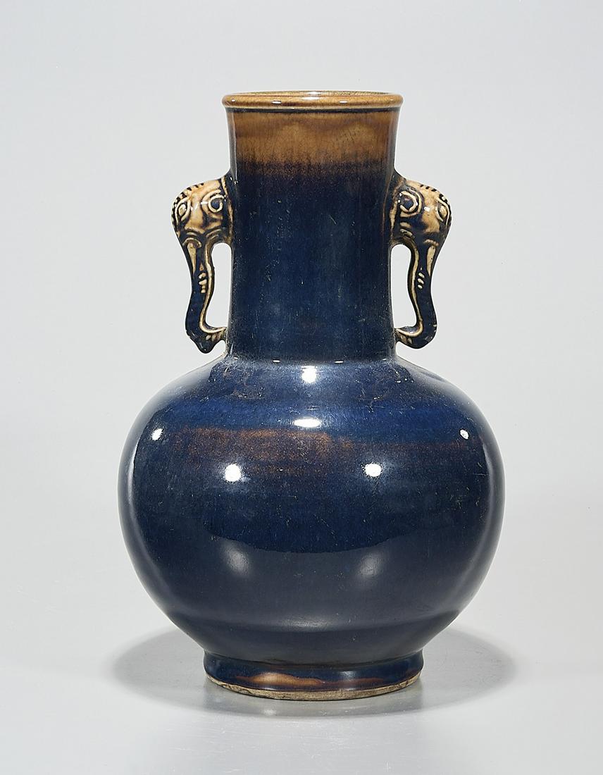 Chinese Glazed Porcelain Globular Vase: Chinese glazed porcelain globular vase; with elephant head handles to neck; 14" x 9" (approx.) Condition: wear, frits, pits, minor loss