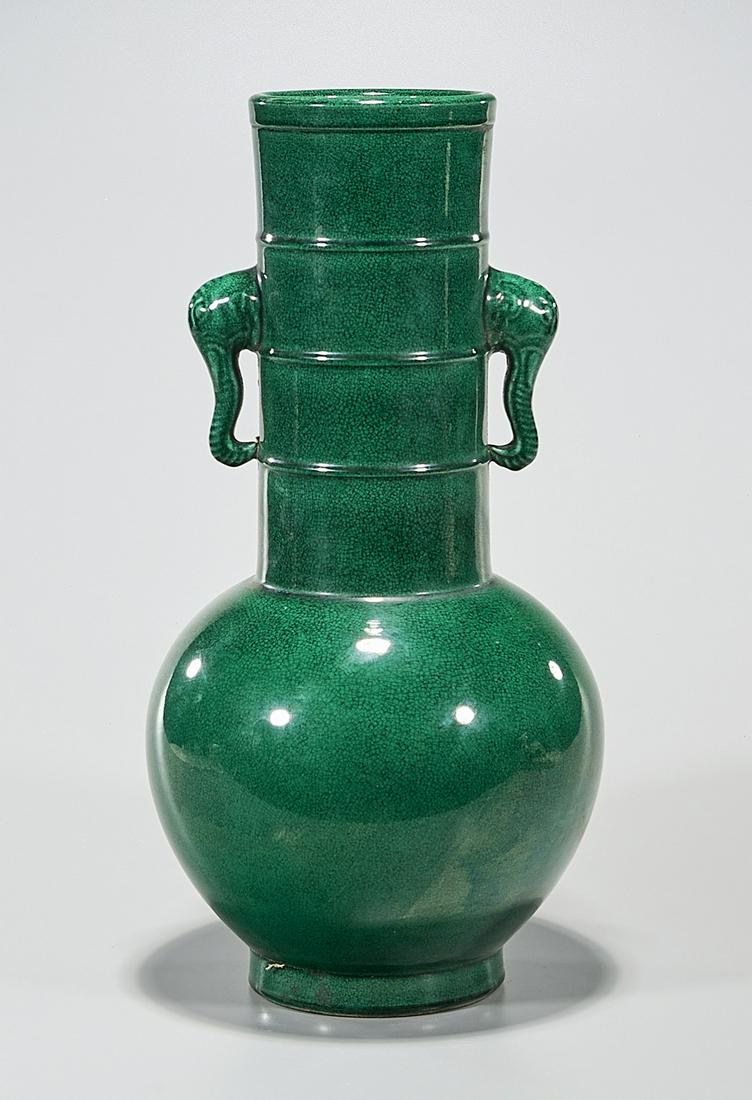 Chinese Green Glazed Porcelain Vase: Chinese green glazed porcelain vase; with bamboo-form slender neck and elephant head handles; 17 1/2" x 9" (approx.) Condition: wear, frits, pits, minor loss