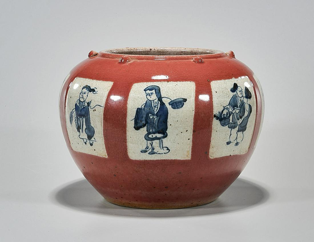 Chinese Red, Blue and White Porcelain Water Pot: Chinese glazed porcelain water pot; with blue and white figures reserved on red ground; 7 1/2" x 9 1/2" (approx.) Condition: wear, frits, pits, minor loss