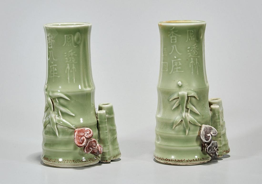 Pair Chinese Green Glazed Porcelain Vases: Pair of Chinese green glazed porcelain vases; of bamboo form; with calligraphy; 7" x 4" (approx.) Condition: wear, frits, pits, minor loss