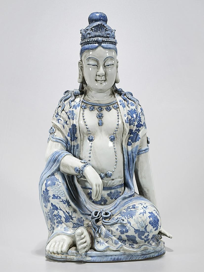 Chinese Blue and White Porcelain Seated Buddha: Chinese blue and white porcelain seated Buddha; 21 1/2" x 11" x 9" (approx.) Condition: wear, minor losses