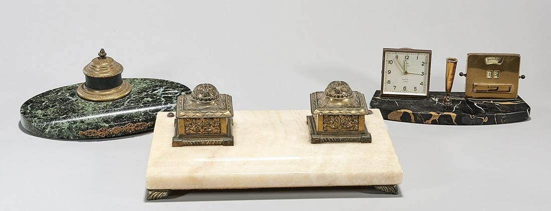 Group of Three Vintage Desk Items: Group of three vintage desk items; including two gilt metal inkwells on marble bases, along with clock, calendar and pen holder on marble or stone base; 3 3/4" x 11 1/2" x 7 1/2" (approx.) Condition: