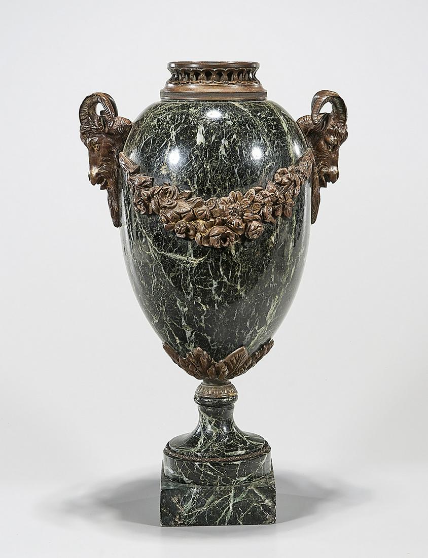 Marble and Ormolu Ram's Head Urn: Heavily-veined black and green marble urn; with gilded floral bands stemming from ram's head handles; 17" x 10" x 8" (approx.)
