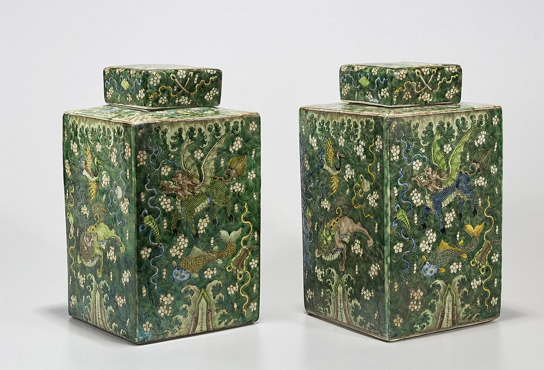 Pair Chinese Famille Verte Porcelain Four-Faceted: Pair of Chinese famille verte porcelain four-faceted covered containers; depicting qlin, phoenix, fish and dragons; 12 1/2" x 7" x 7" (each, approx.) Condition: wear, frits, pits,minor losses