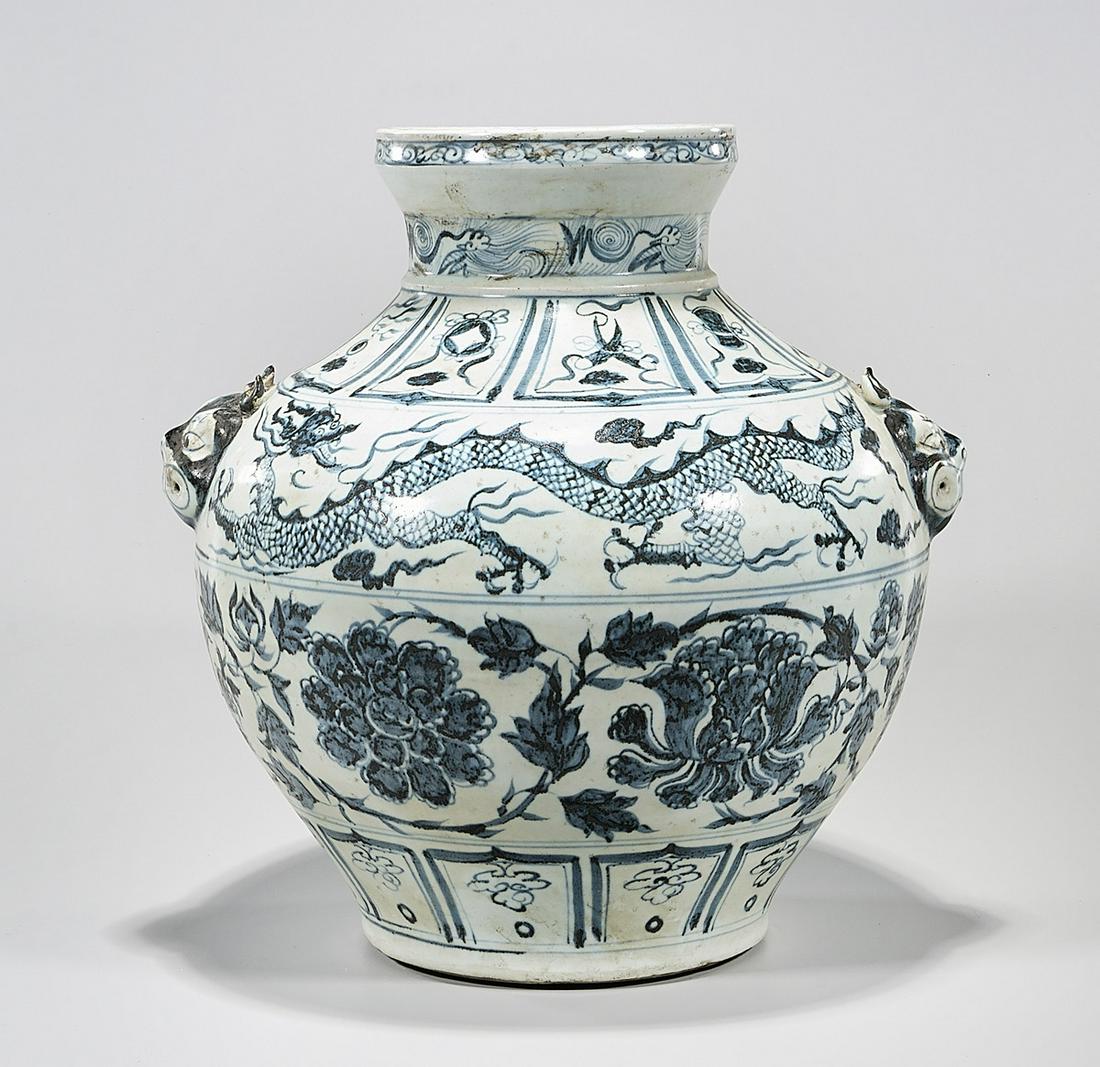 Chinese Blue and White Porcelain Vase: Chinese blue and white porcelain vase; with dragon chasing pearls motif; 15" x 15" x 13" (approx.) Condition; wear, frits, pits, minor loss