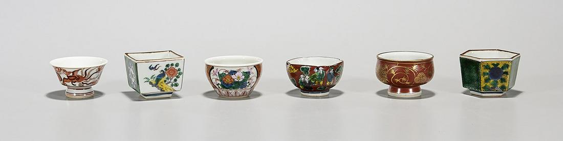 Set of Six Old Japanese Porcelain Tea Cups: Six Japanese enameled porcelain tea cups; original box; late 19th to early 20th c. D: 2" (largest, approx.) Condition: general wear