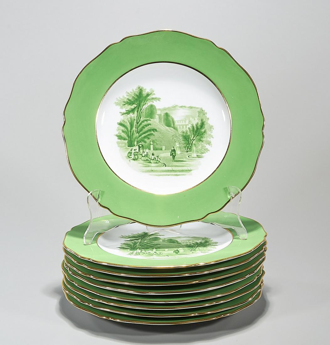 Group of Spode Copeland Luncheon Plates: Group of 9 Spode Copeland England luncheon plates; green and gilt borders with landscape design; D: 10 1/2" (approx.)