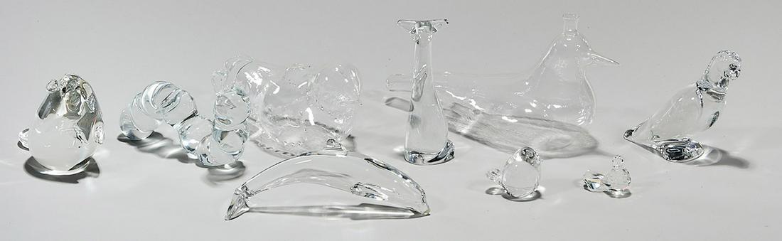Group of Nine Crystal and Glass Animal-Form Articles: Group of nine Baccarat and other glass animal-form articles; including seven crystal-three Baccarat, one Steuben, one Swarovski, one with illegible mark, one unsigned; and two blown glass; 4 3/4" x 1