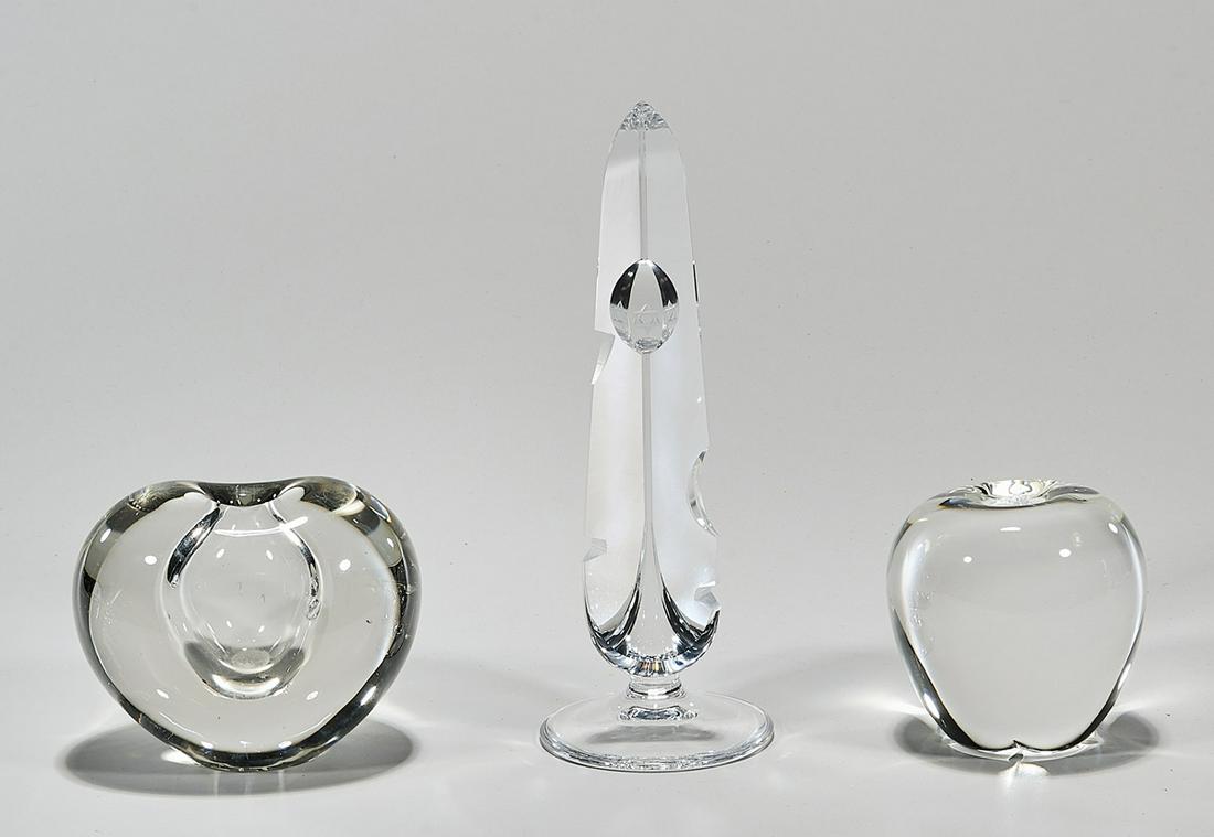 Group of Three Signed Crystal Glassware Pieces: Group of three signed crystal pieces; including a Josair "Star of David" obelisk, Steuben apple paperweight, and illegibly marked interior blown apple paperweight; 8 1/2" x 3" (tallest, approx.)