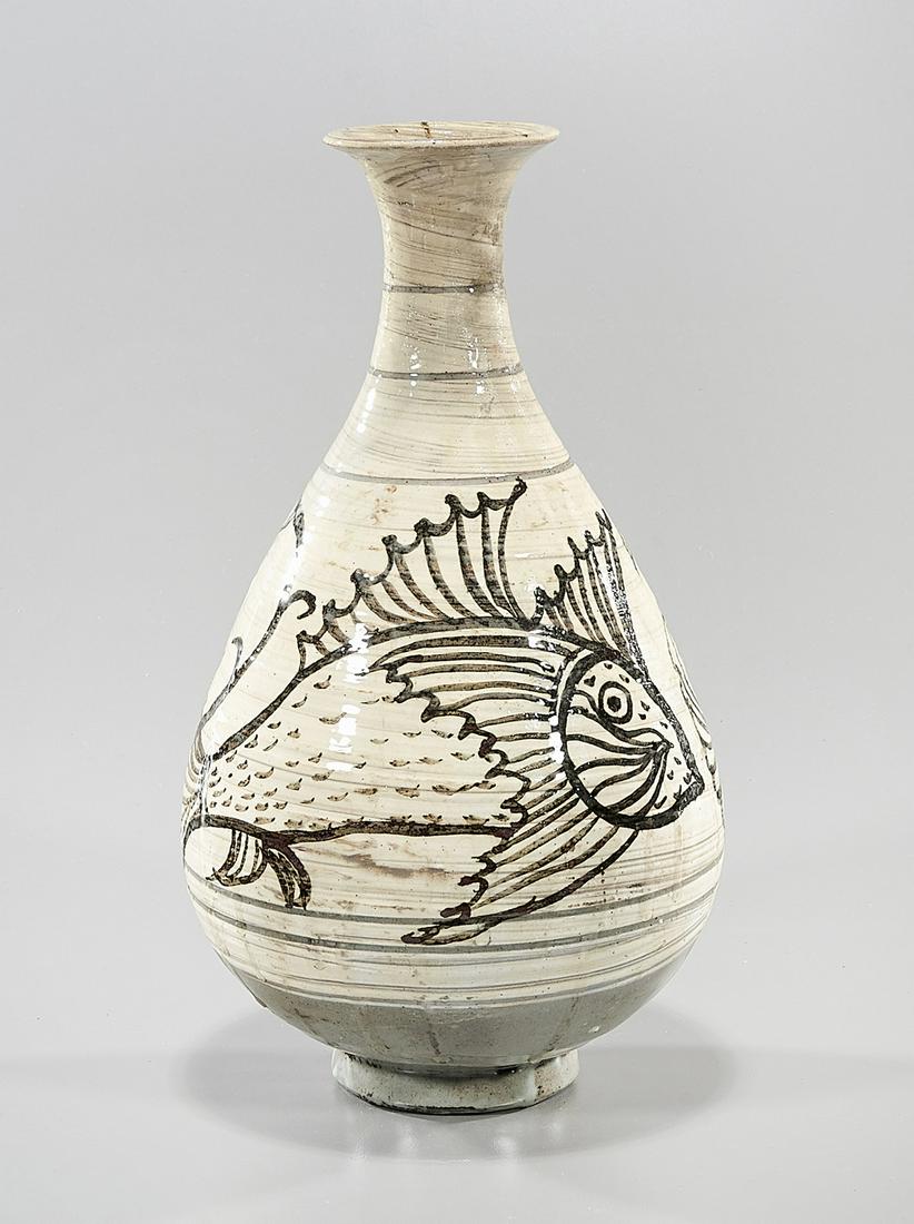 Korean Glazed Incised Ceramic Vase: Korean glazed incised ceramic vase; with fish design; 11" x 6" (approx.)Condition; wear, pits, firing flaws, glaze runs