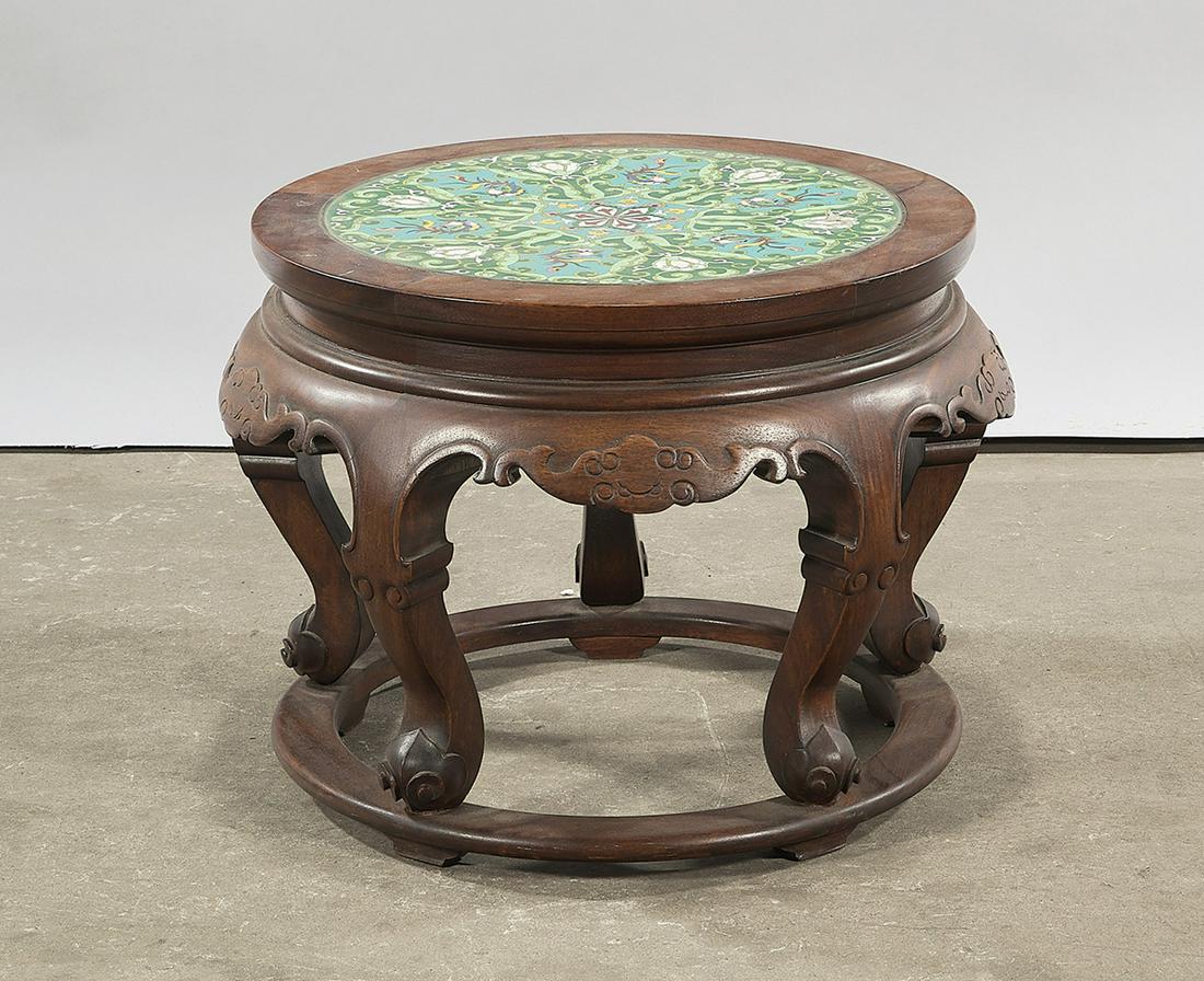 Chinese Cloisonne Inlaid Carved Wood Stool: Chinese cloisonne inlaid carved wood stool; carved bat embellishment with phoenix motif to top; 13 1/2" x 19" (approx.)