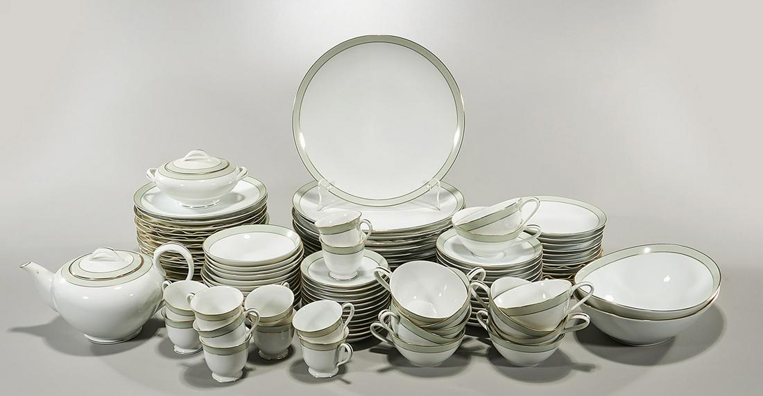 Group of Noritake Nippon Toki Kaisha Porcelains: Group of Noritake Nippon Toki Kaisha china; 99 pieces, including 12 coffee cups, 11 tea cups, 12 tea saucers, 12 coffee saucers, 12 bread plates, 12 vegetable bowls, 12 salad plates, 12 dinner plates;