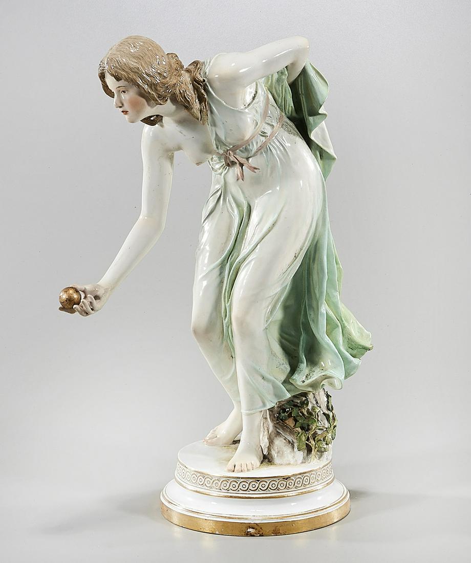Antique Meissen Figure of a Woman: Antique Meissen Classical-style woman; partially disrobed and stooped with gold ball in extended hand, on stepped circular base with gold band; 14 1/8" x 9 1/4" x 6" (approx.)