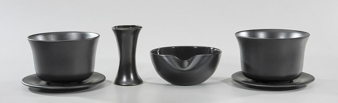 Six Pieces of Elsa Peretti for Tiffany: Six black ceramics by Elsa Peretti for Tiffany & Co.; including two flower pots with dishes; thumb bowl and vase; 6" x 3 1/4" (tallest, approx.)