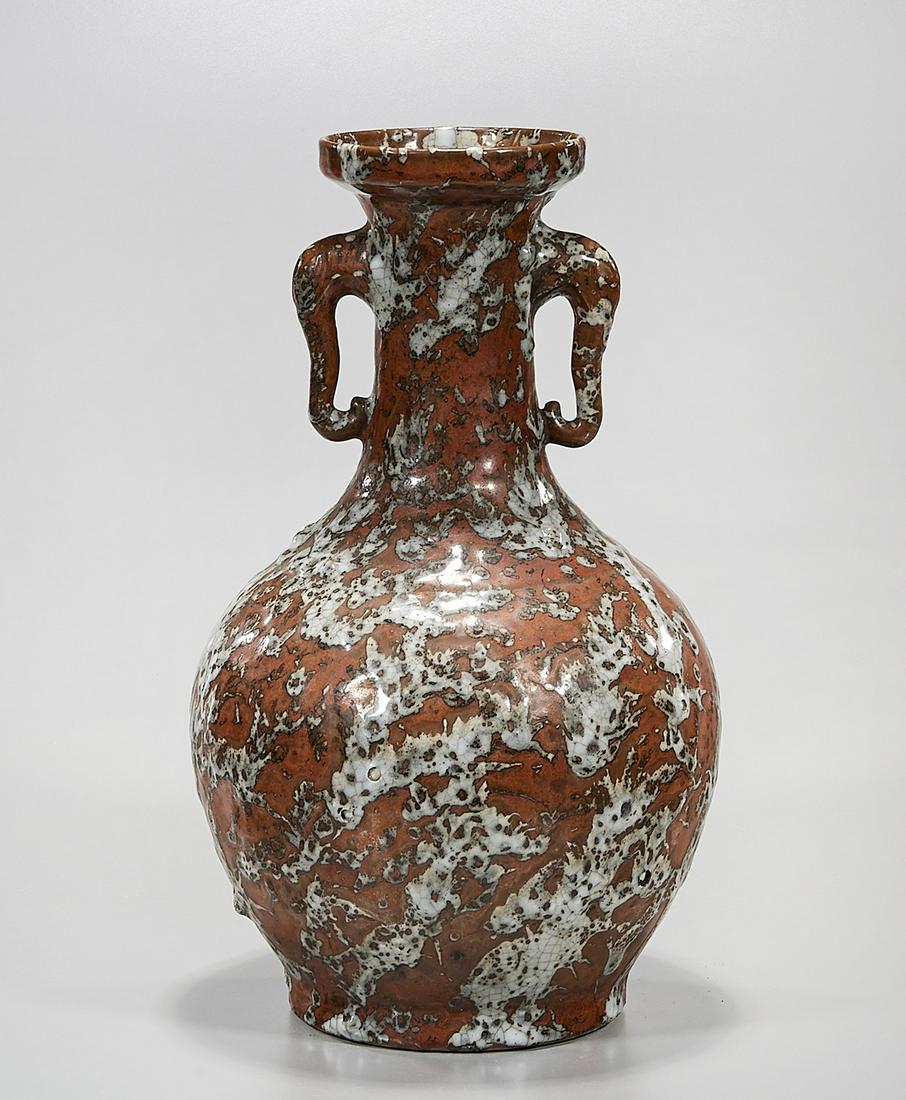 Chinese Glazed Ceramic Vase: Chinese glazed ceramic vase; iron rust and white; handles to neck; 13 1/4" x 7" (approx.) Condition: general wear, frits, pits, minor losses