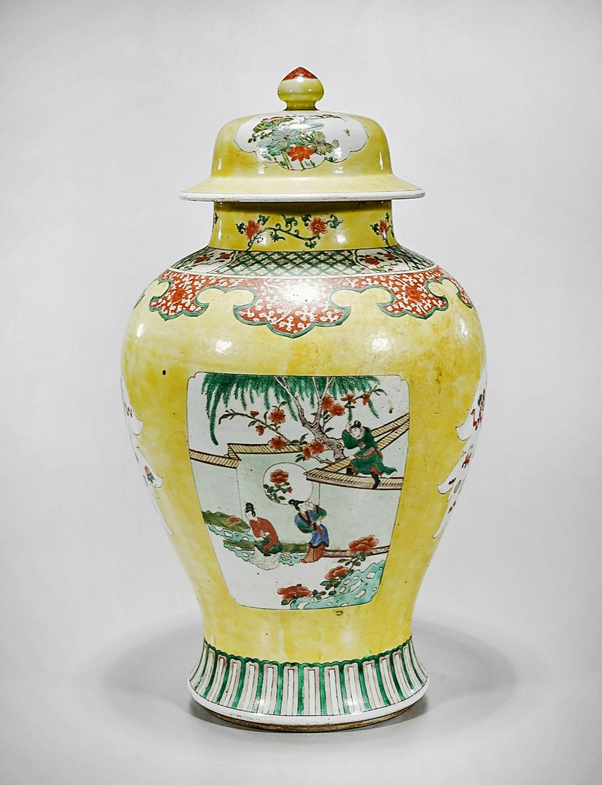 Tall Chinese Enameled Porcelain Covered Vase: Tall Chinese enameled porcelain covered vase; central scenes with figures and flowers; 23" x 13 1/2" (approx.) Condition: wear, frits, pits, minor loss
