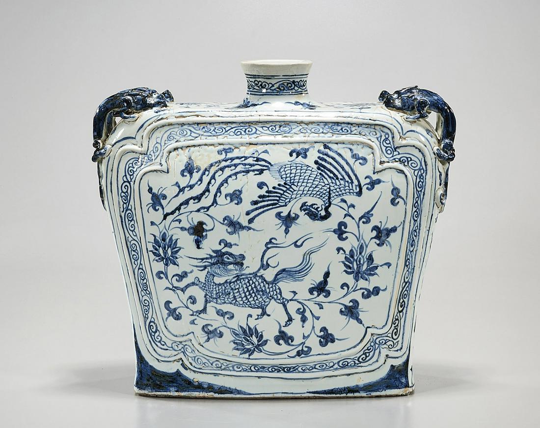 Chinese Blue and White Porcelain Vase: Chinese blue and white porcelain vase; chilongs to shouder corners; phoenix motif; 13 1/2" x 14 1/2" x 6" (approx.) Condition: wear, frits, pits, firing flaws; losses