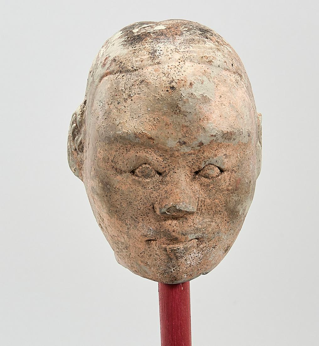 Chinese Han Dynasty Pottery Head: Chinese Han Dynasty pottery head; on stand; 4" x 2 3/4" x 3" (approx.)