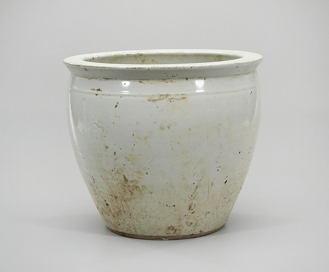 Chinese Glazed Porcelain Jardiniere: Chinese white glazed porcelain jardiniere; 12" x 14 1/2" (approx.) Condition: wear, frits, pits, minor loss