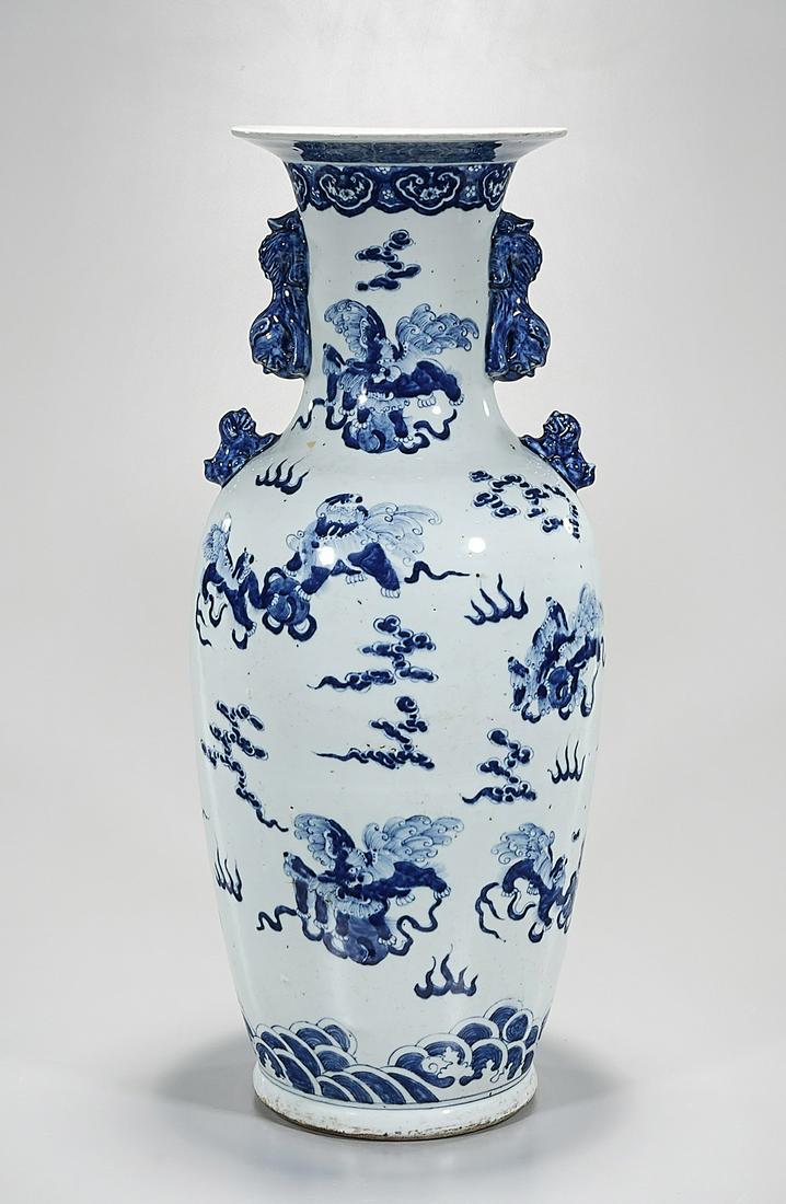 Tall Chinese Blue and White Porcelain Vase: Tall Chinese blue and white porcelain vase; depicting qilin chasing pearls; 26" x 11" (approx.) Condition: wear, frits, pits, minor loss