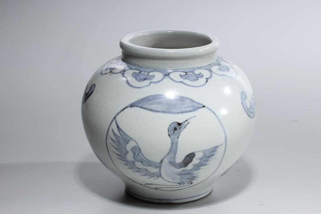 Korean Blue and White Porcelain Jar: Korean blue and white porcelain jar; with bat and bird decoration; 6 1/2" x 7" (approx.)