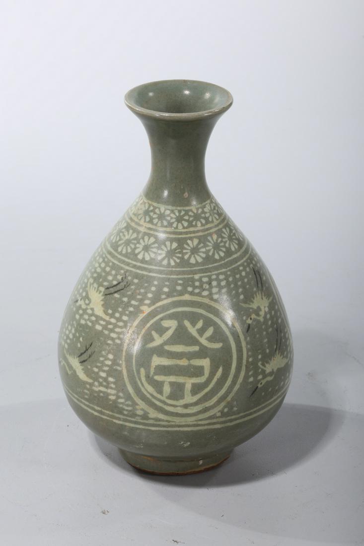 Korean Celadon Glazed Wine Vessel: Korean celadon glazed wine vessel; depicting cranes, with characters; 6" x 3 3/4" (approx.)
