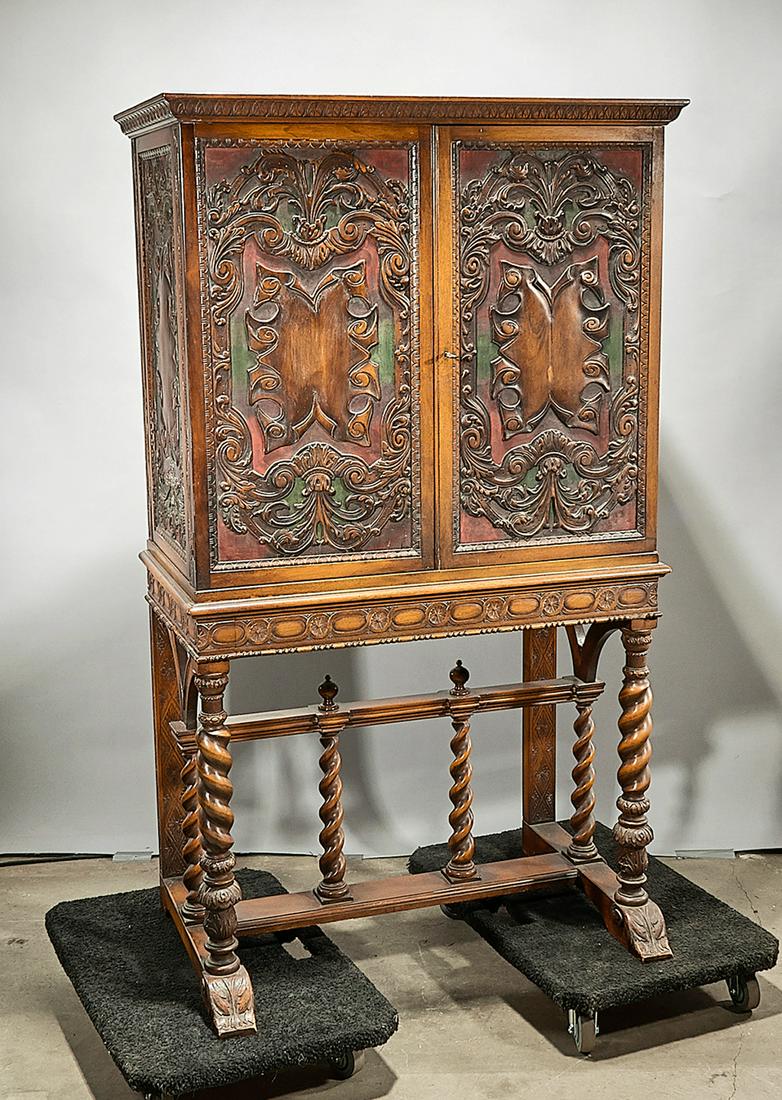 Continental Renaissance-Style Cabinet: Continental Renaissance-style cabinet; carved and partially painted panels to top; with spindle column legs 37" x 38" x 22" (approx.)