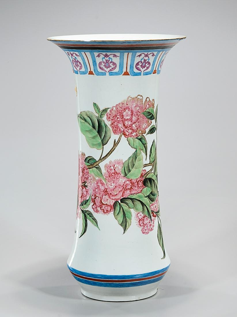 Chinese Enameled Porcelain Gu-Form Vase: Chinese enameled porcelain gu-form vase depicting flowers; 17" x 9" (approx.) Condition: general wear, frits, pits, minor losses