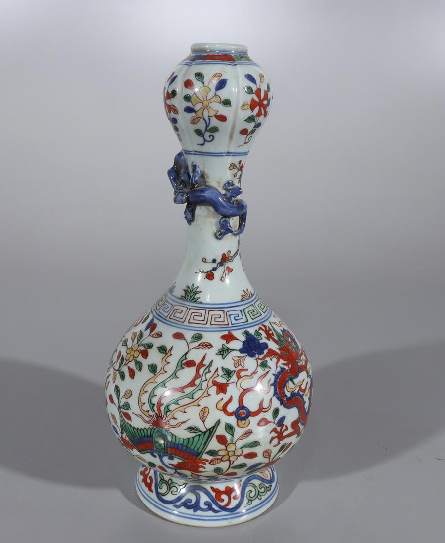 Chinese Wucai Garlic Mouth Porcelain Vase: Chinese wucai garlic mouth porcelain vase with dragons, phoenix birds, and six-character Longqing mark to base; H 12" x D 5 1/2" (approx.)