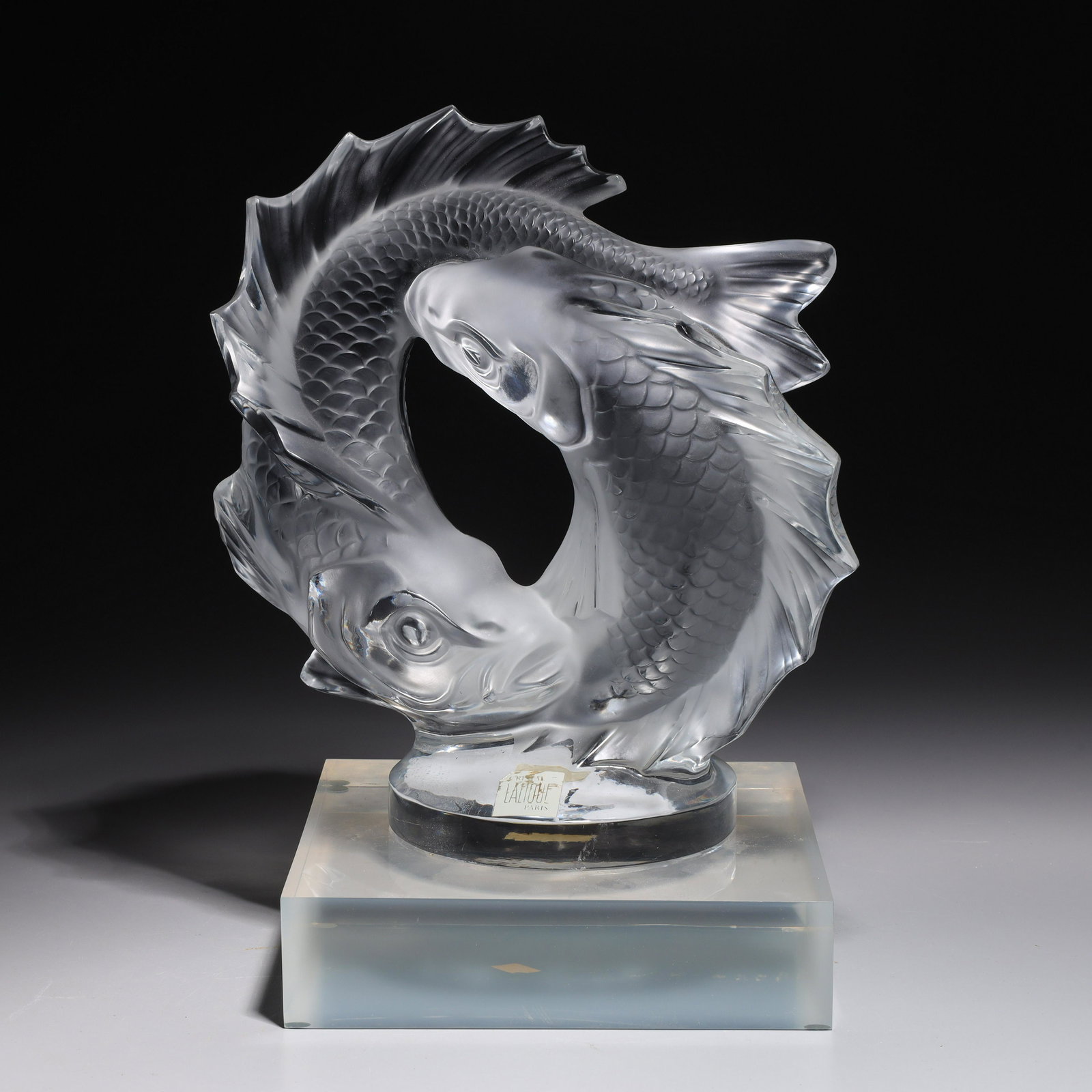 Lalique Pisces Glass Sculpture: Lalique Pisces double fish glass sculpture, with Lalique Paris label to base of sculpture, with custom lucite base; including base H 13 1/2" x W 10 1/4" x L 8" (approx.) Provenance: Private Beverly Hi