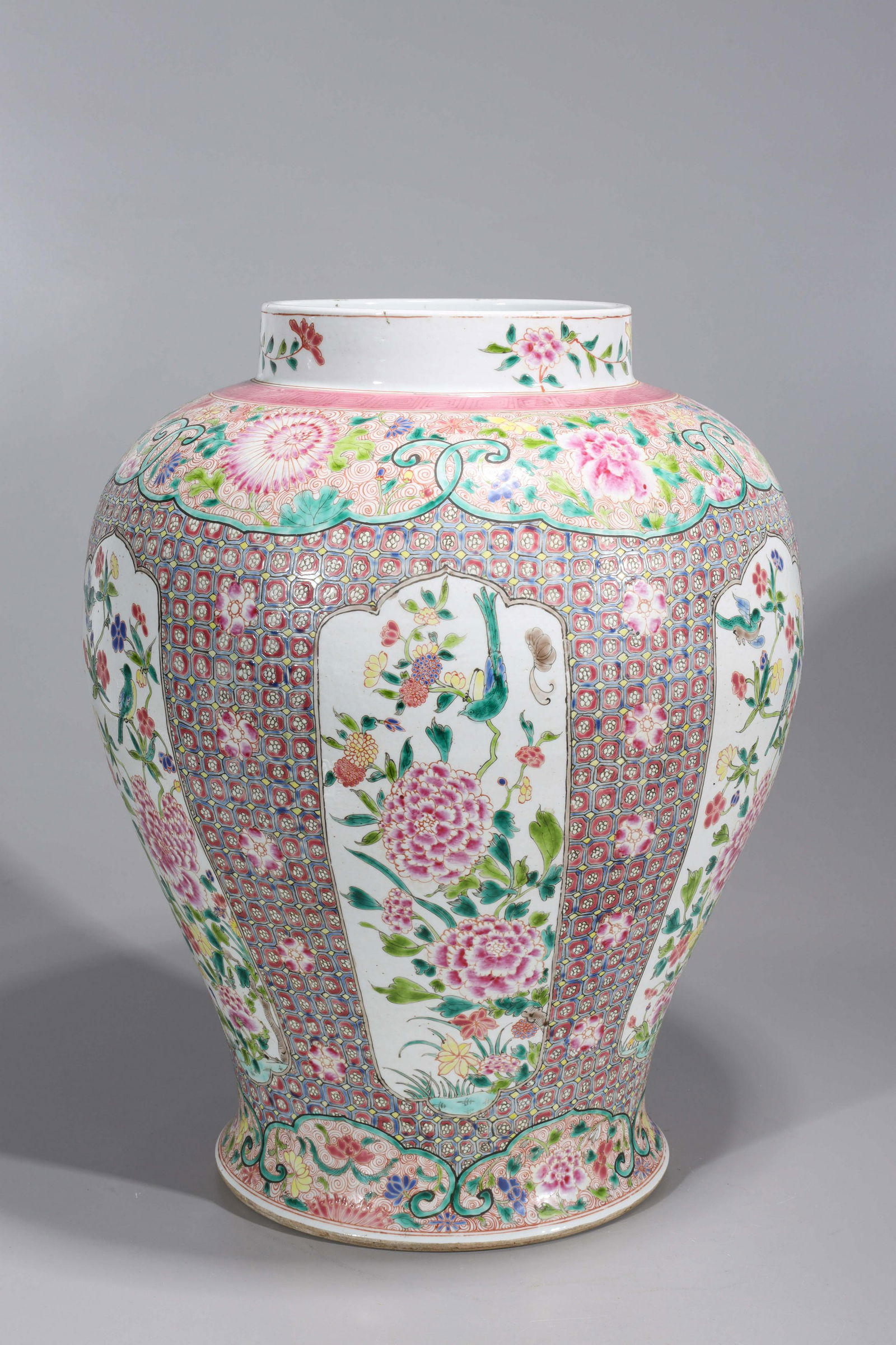 Chinese Famille Rose Enameled Porcelain Vase: Chinese famille rose enameled porcelain vase with allover floral and foliate designs; good condition, minor losses to enamel; H 18 1/2" x D 14 1/2" (approx.)