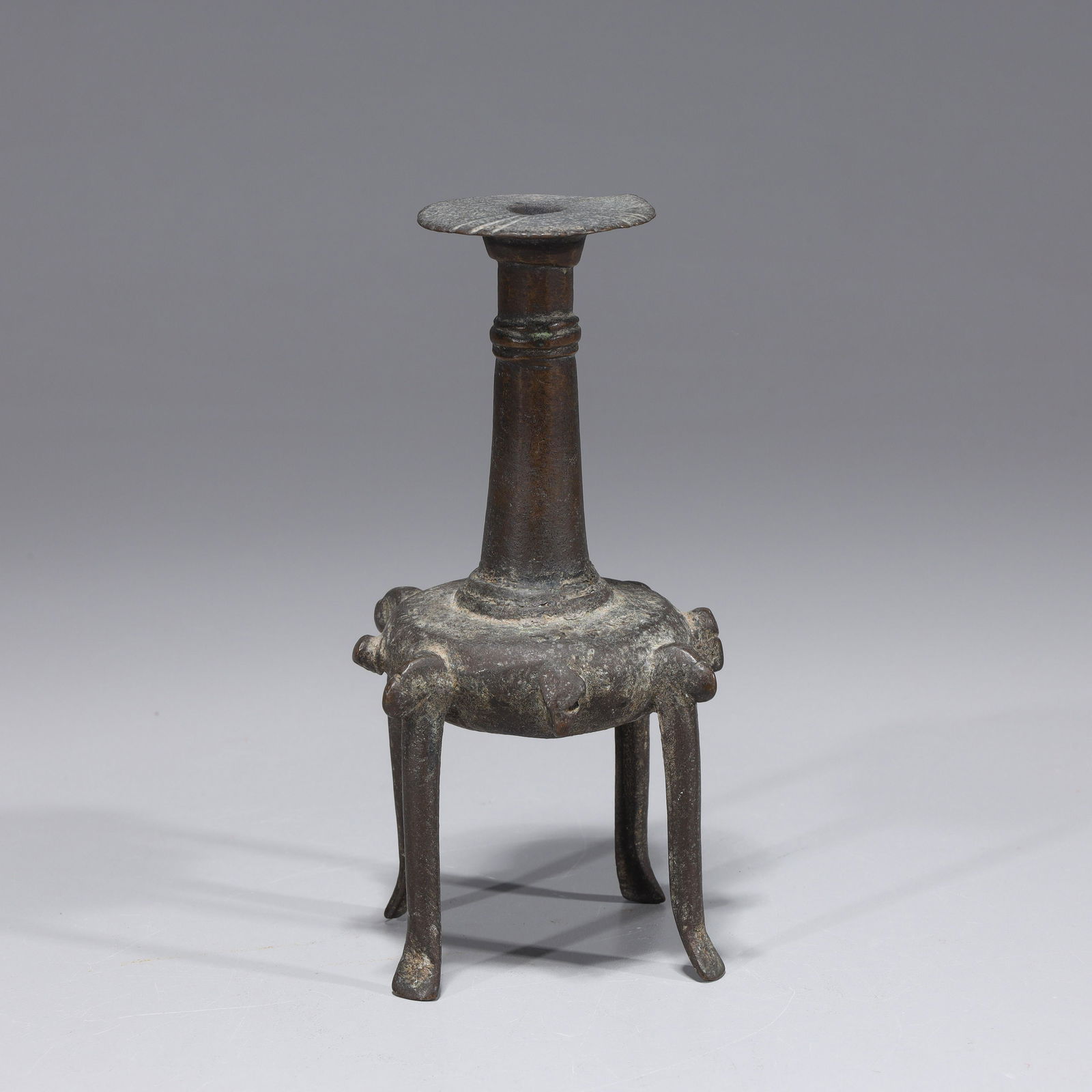 Bronze Antique Islamic kohl (surma dani) bottle: Bronze Antique Islamic kohl (surma dani) bottle. Used mostly by women but at times men would use as well, bottles like this held makeup similar to eye liner or mascara by grinding stibnite, sometimes