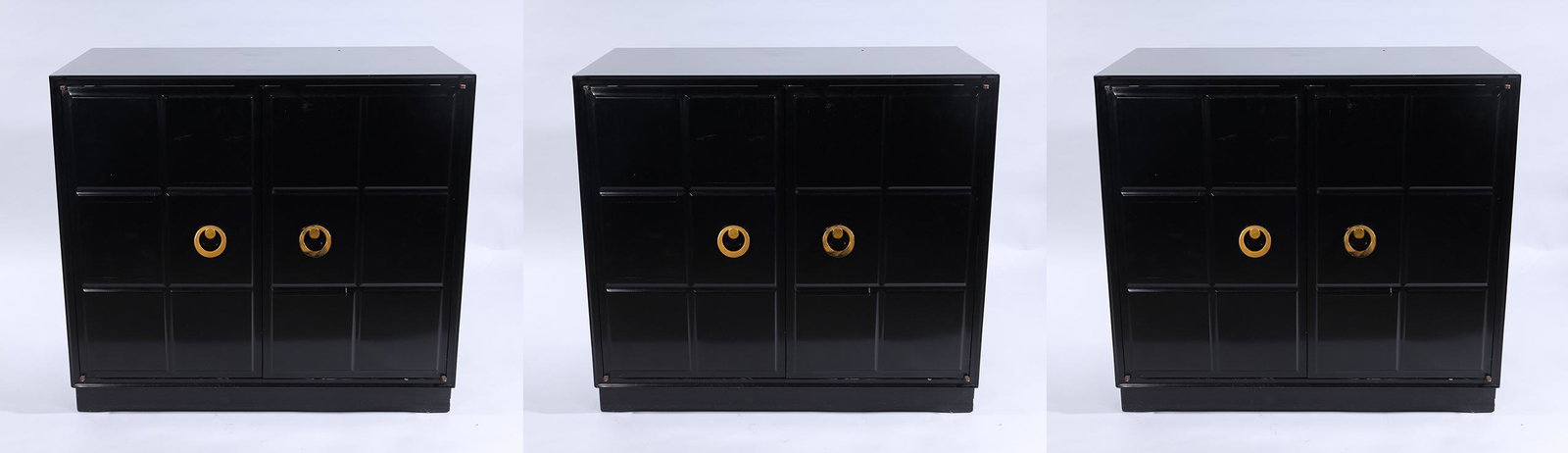 Set of Three Double Doored Cabinets: Group of three wood double-doored cabinets; metal handles; two with removed backs 33" x 27" (approx.)