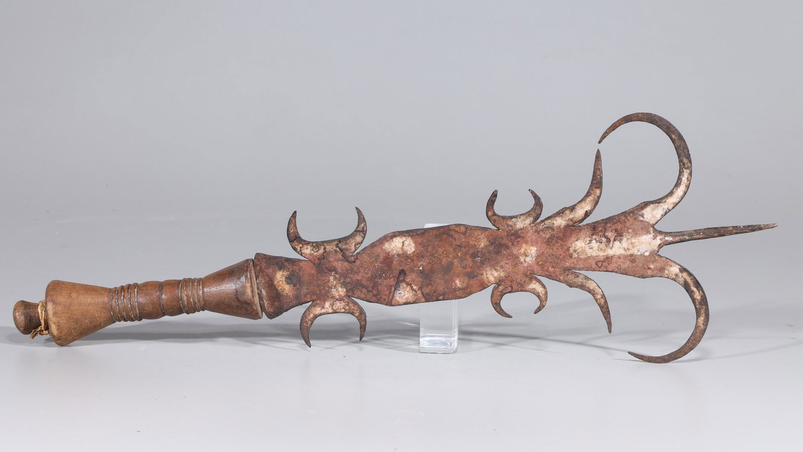 West African Tribal Blade: Early 20th century West African tribal dagger with intricately shaped blade, wooden handle; overall good condition, commensurate rust and patina to blade; L 20" x W 6 1/2" x D 2" (approx.) Provenance: