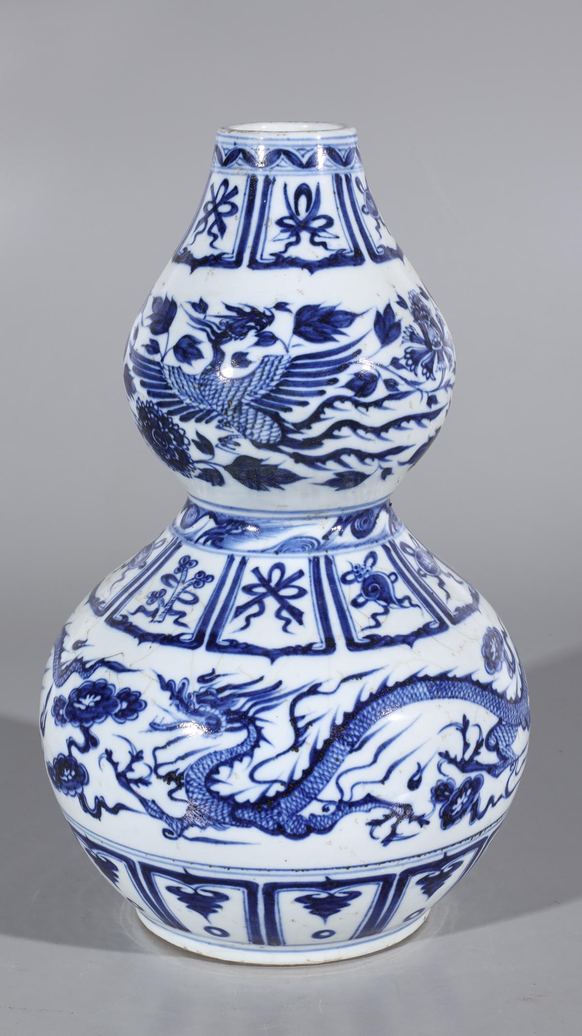 Chinese Blue & White Porcelain Double-Gourd Vase: Chinese blue and white double-gourd vase with dragons, phoenix birds, and precious vessels to the body; overall good condition, minor wear and soiling; H 17 1/2" x D 10 1/4" (approx.)