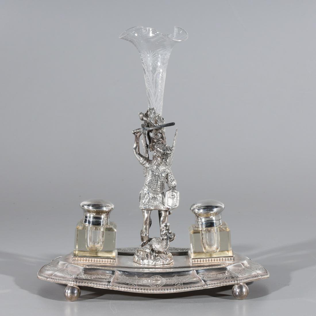 Silver & Glass Pen & Ink Stand: Pen and ink stand crafted from glass and silver plated metal with figure of St. George slaying the dragon, including one glass flute for pens and two covered ink bottles, the stand with allover floral
