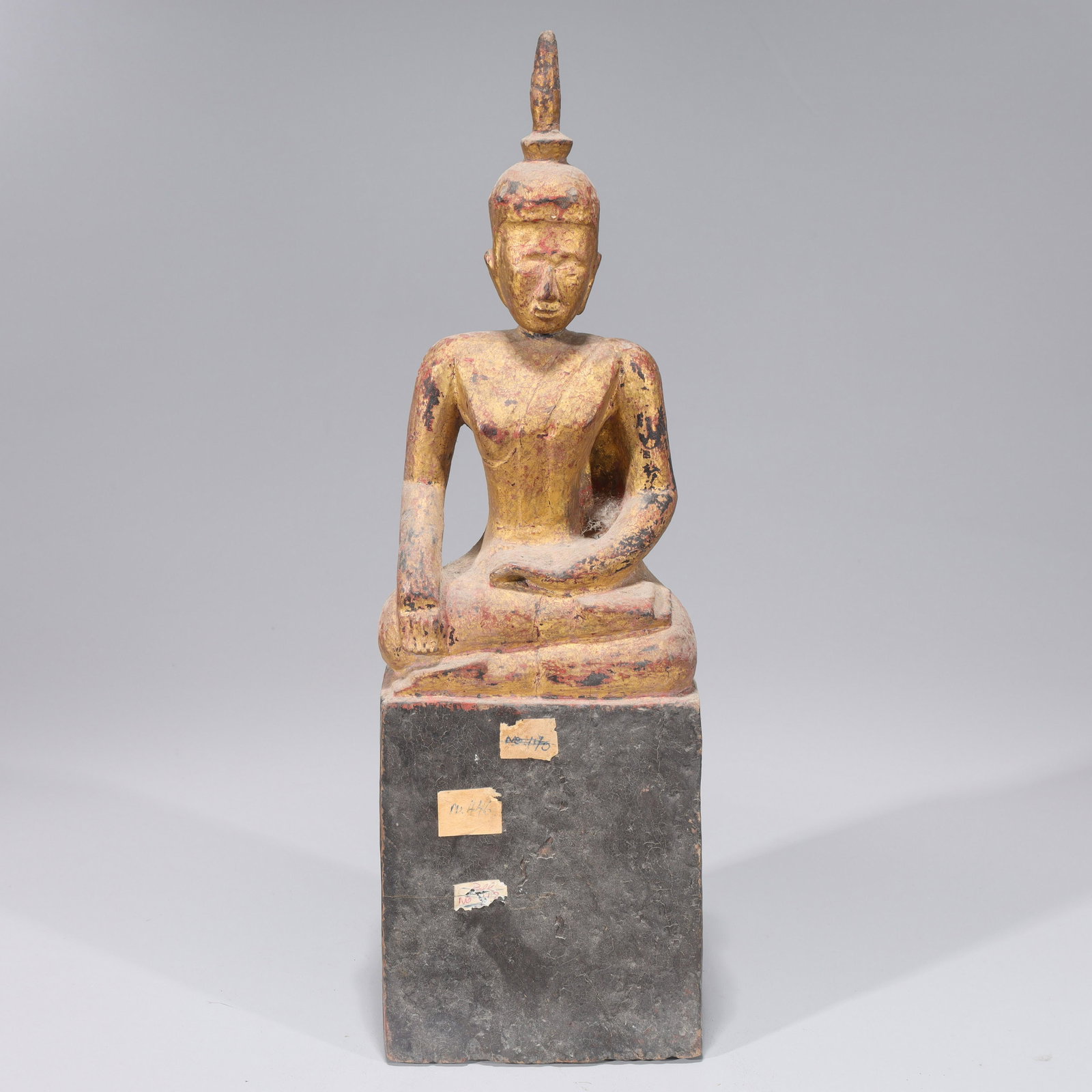Antique Thai Gilt Wood Seated Buddha: Antique Thai, circa 1900, gilt wood carved seated figure of Buddha; as-is condition, surface wear and scratches, flaws, some chips; H 14" x L 4 1/2" x W 3" (approx.); Provenance: Collected between 194