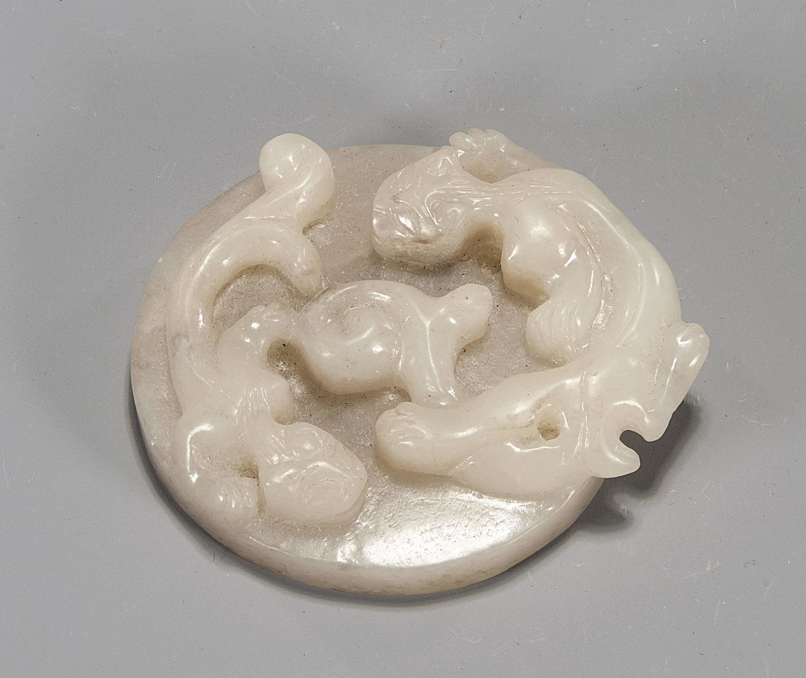 Chinese Carved Jade Circular Plaque: Chinese carved jade circular plaque, with two chilong; D: 2 1/2"