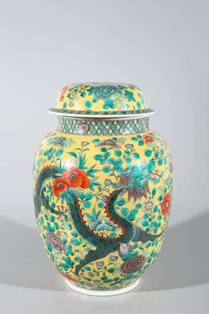 Chinese Famille Verte Enameled Porcelain Covered Dragon: Chinese famille verte enameled porcelain covered yellow ground dragon vase with allover designs and gilt detail; overall good condition; H 19 1/2" x D 13 1/2" (approx.)