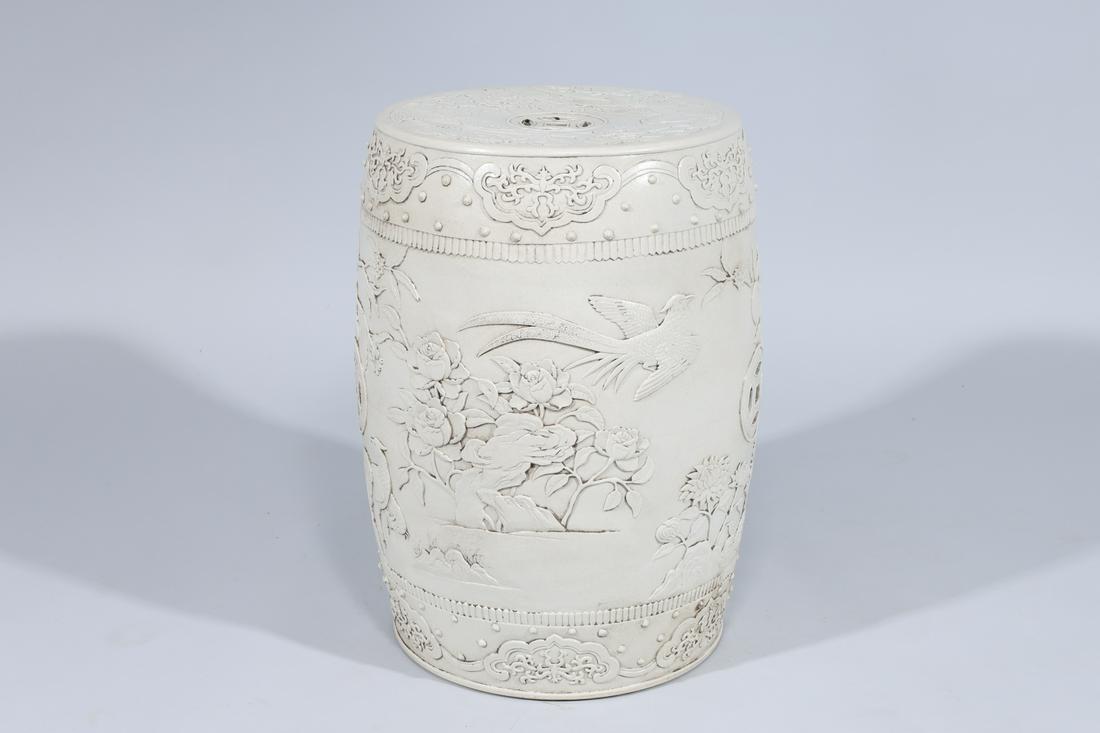 Chinese Porcelain Garden Seat: Chinese porcelain garden seat with birds, floral, and foliate designs in high-relief, with six-character Guangxu mark to neck but later; overall good condition, minor wear, minor pitting; H 19" x D 15