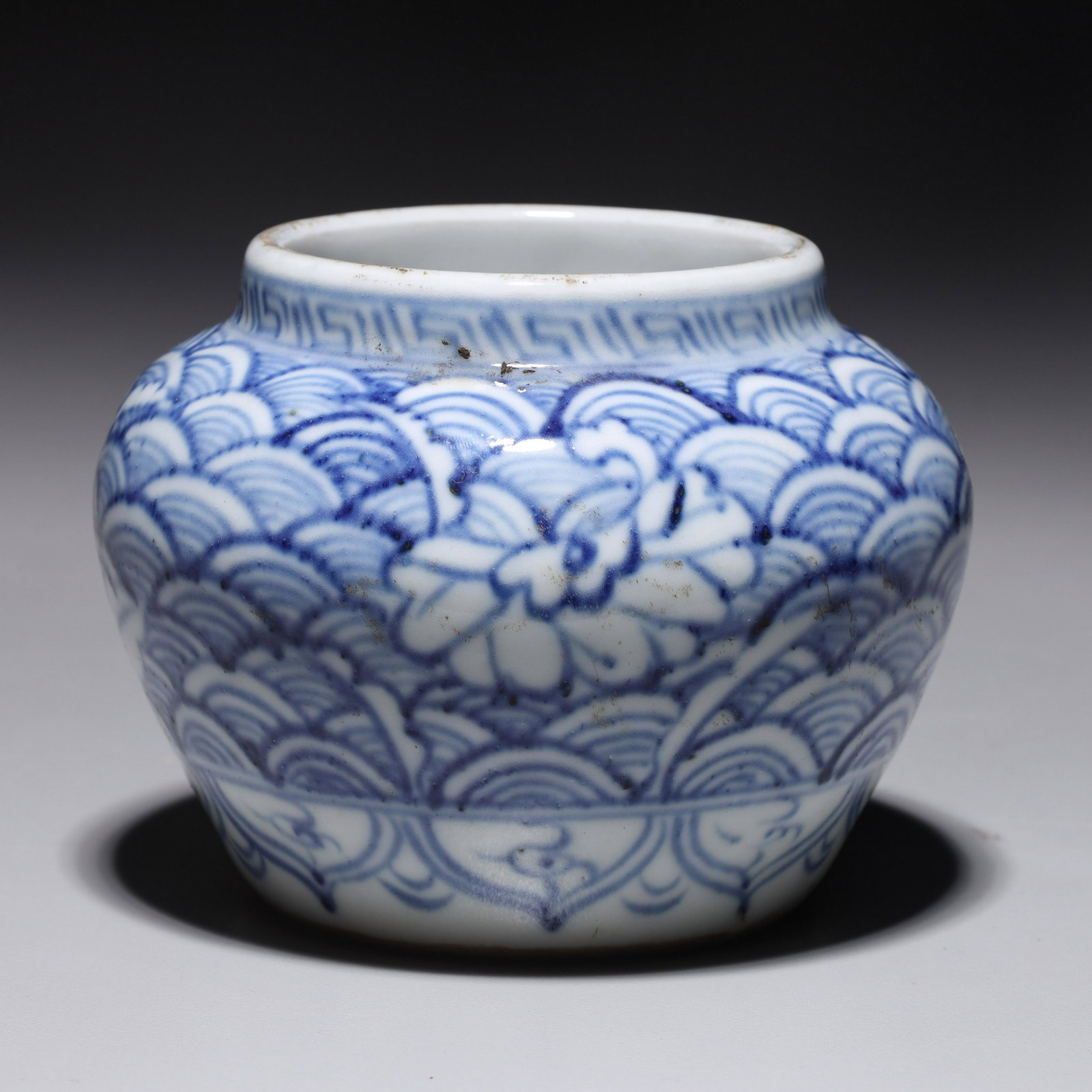 Chinese Blue & White Porcelain Jarlet: Chinese blue and white porcelain early style jarlet with allover designs; overall good condition, minor wear, minor soiling; H 3 1/2" x D 4 1/2" (approx.)