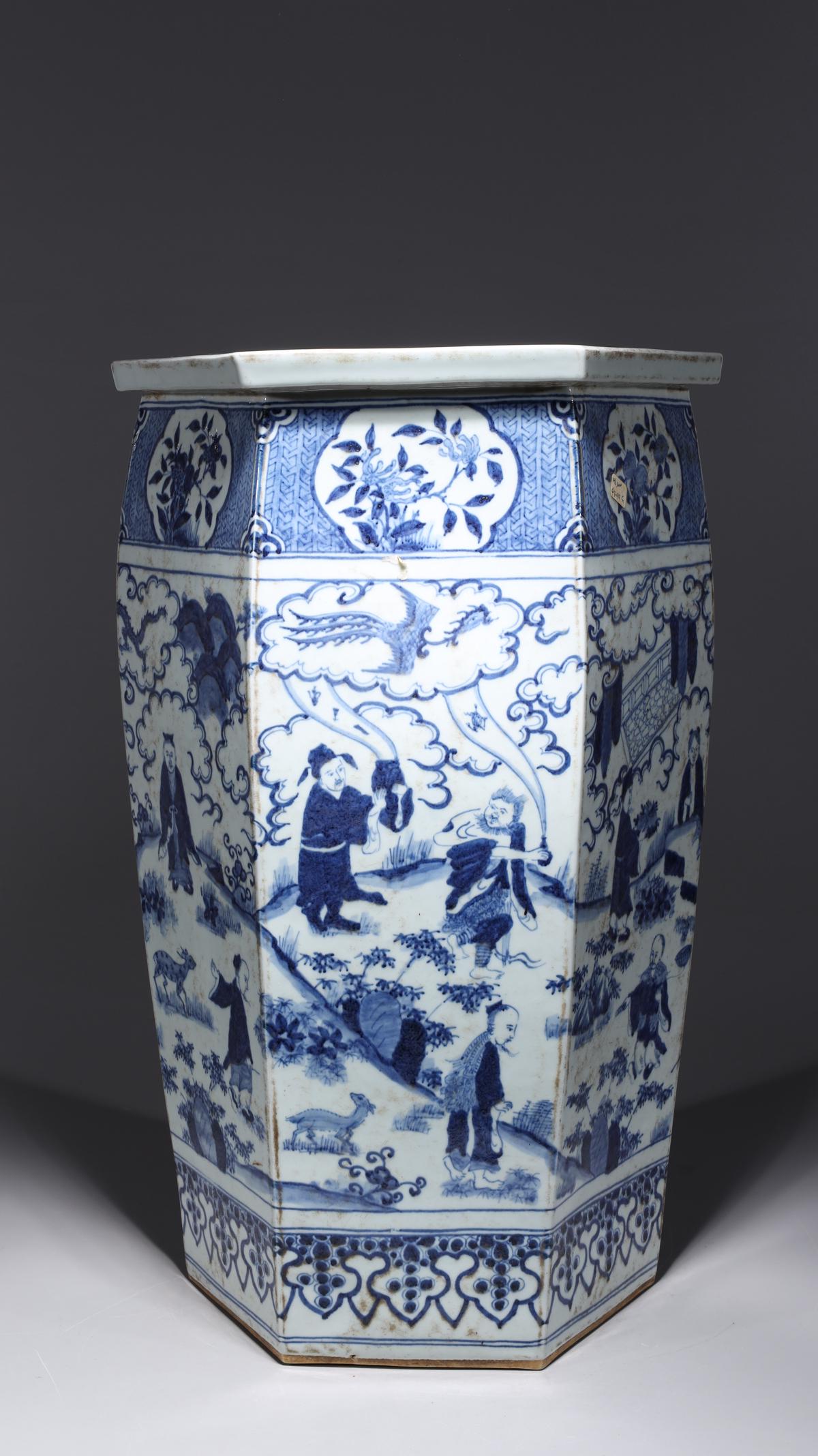 Chinese Blue & White Porcelain Umbrella Stand: Chinese blue and white porcelain hexagonal umbrella stand with scholars and dragons to body; some wear and soiling; H 21" x D 13 1/2" (approx.)