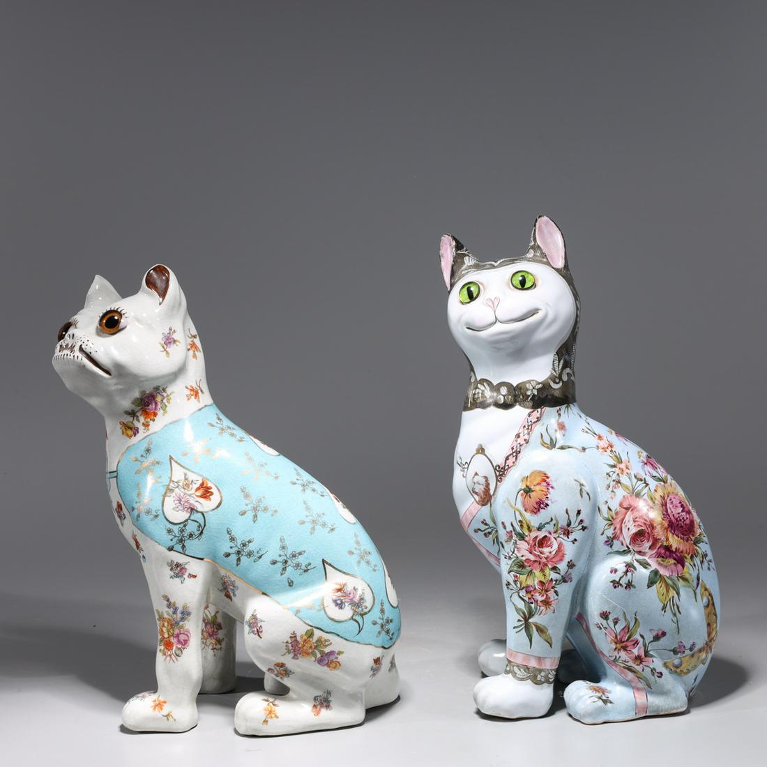 Emile Galle Faience Cat & Bull Dog: Emile Galle faience pottery cat with glass bead eyes and allover decoration and Emile Galle faience dog with gilt detail, glass eyes, and allover floral detail; some surface scratches on both; cat H 1