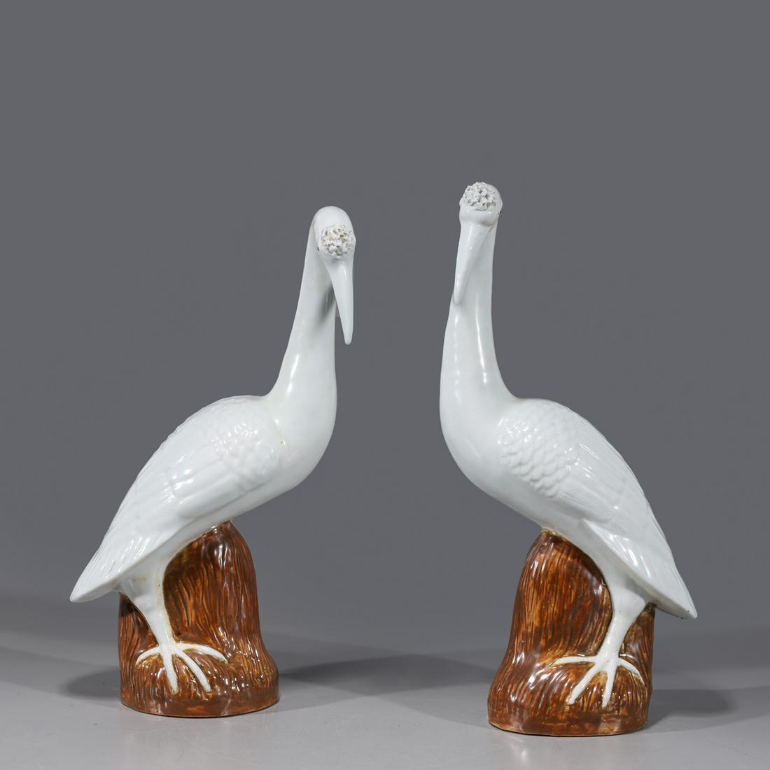 Pair of Chinese Porcelain Cranes: Pair of Chinese porcelain cranes; overall good condition; the larger H 16 1/2" x W 5" x L 8 3/4" (approx.)