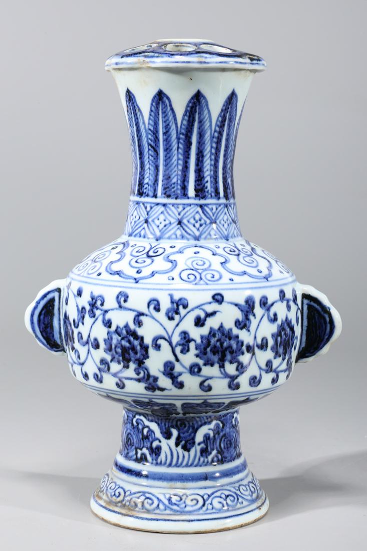 Chinese Blue & White Porcelain Vase: Chinese blue and white porcelain vase with floral designs and molded handles, with six-character Xuande mark to base; overall good condition, minor soiling; H 11 1/2" x W 7 1/4" x D 5 3/4" (approx.) P