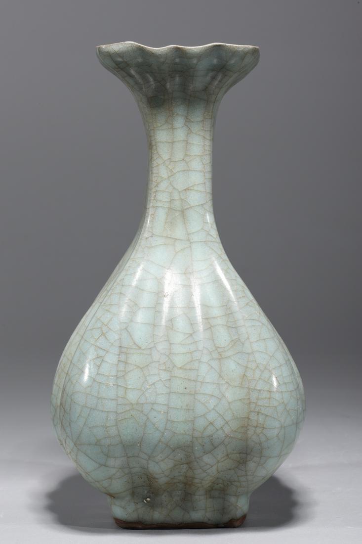 Chinese Celadon Crackle Glazed Porcelain Vase: Chinese celadon crackle glazed porcelain vase; overall good condition; H 9" x W 5 1/2" x D 5 1/2" (approx.)Provenance: Private Florida, USA Collection