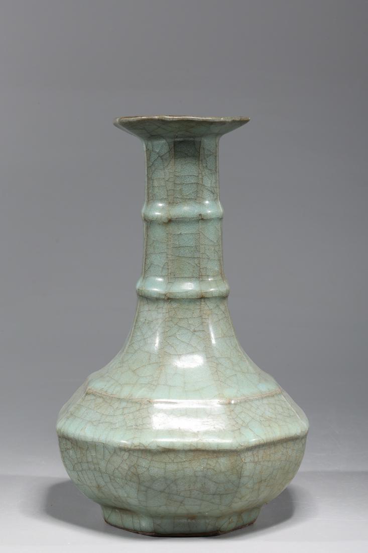 Chinese Celadon Faceted Porcelain Vase: Chinese celadon faceted porcelain vase; overall good condition; H 9 1/4" x D 6" (approx.)Provenance: Private Florida, USA Collection